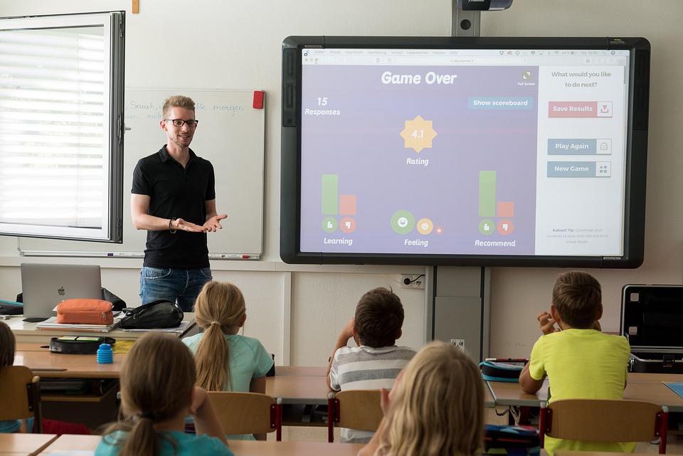 Teacher using whiteboard