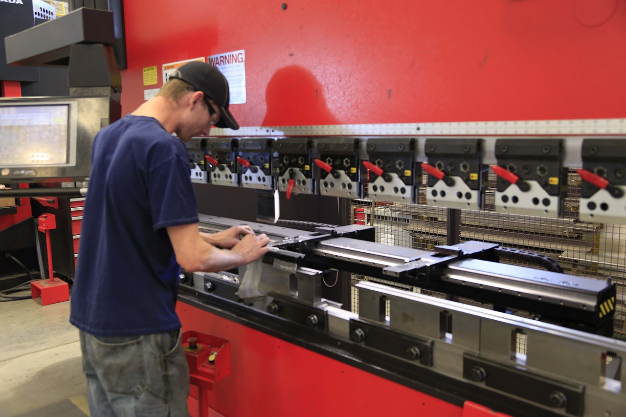 Metal Worker working on metal press